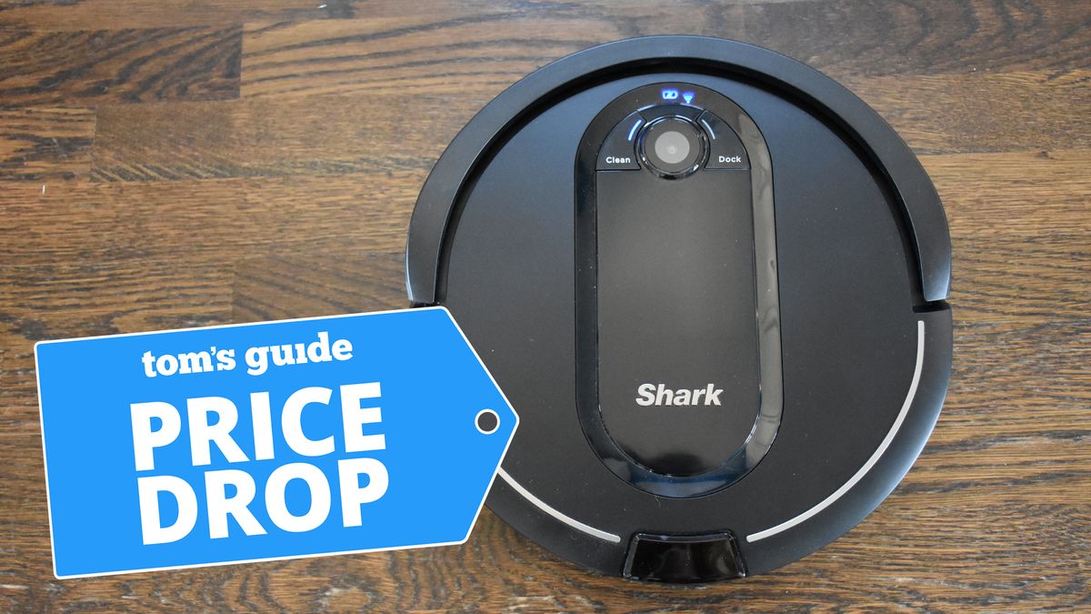 Shark robot vacuum on hardwood floor