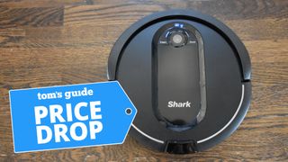 Shark robot vacuum on hardwood floor
