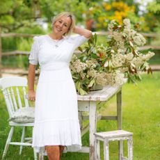 Shirlie Kemp in garden in white dress