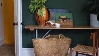Farrow & Ball green paint on a study wall to illustrate the forest green color trend