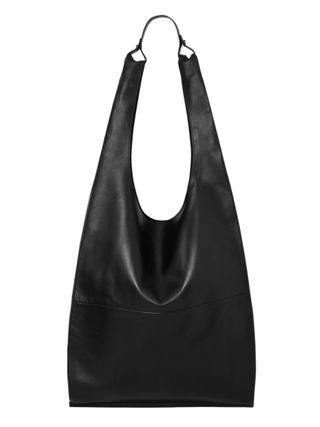 A black leather, design-forward tote bag with a luxe feel.