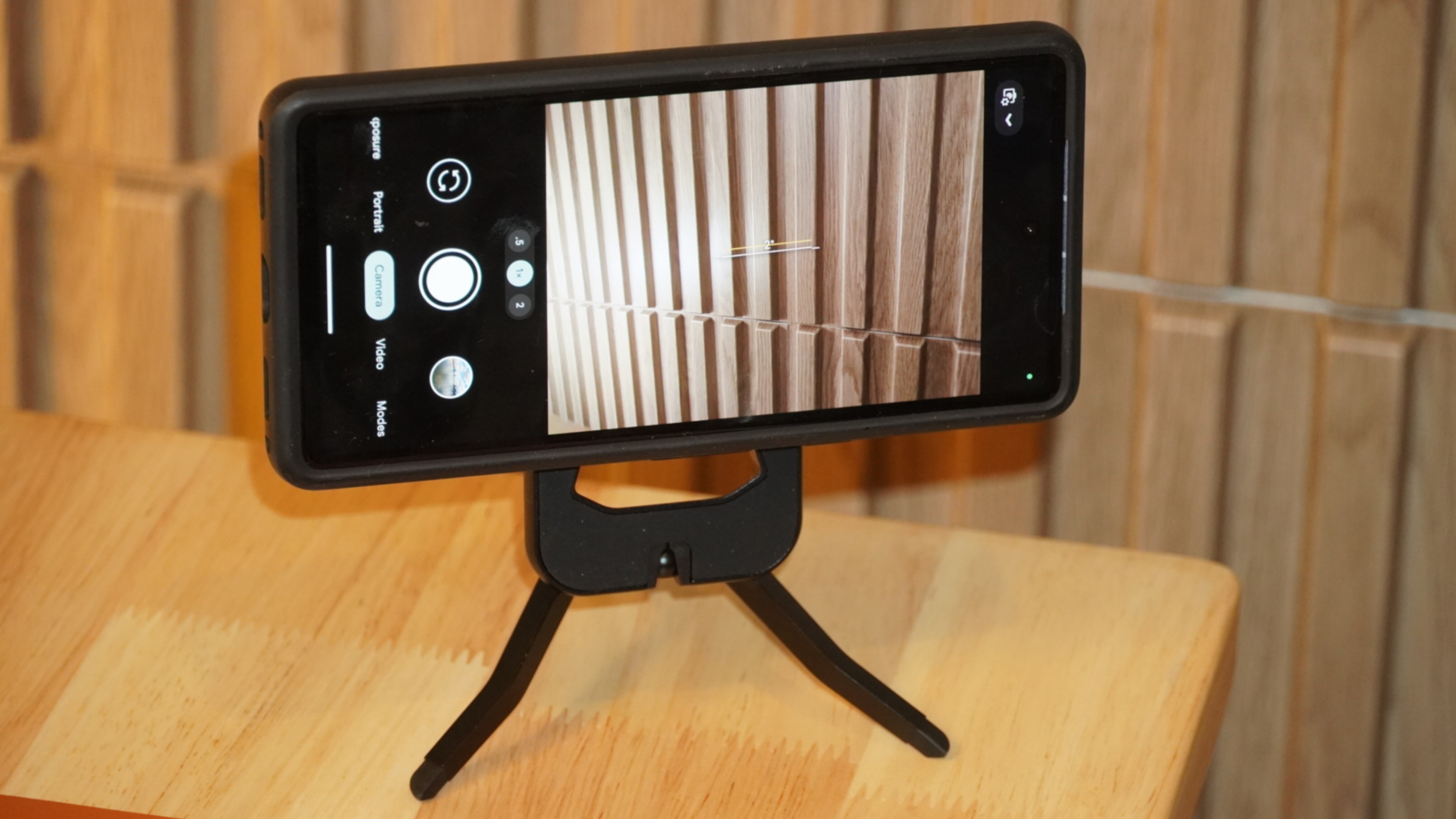 A Pixel phone on a Peak Design Mobile Tripod.