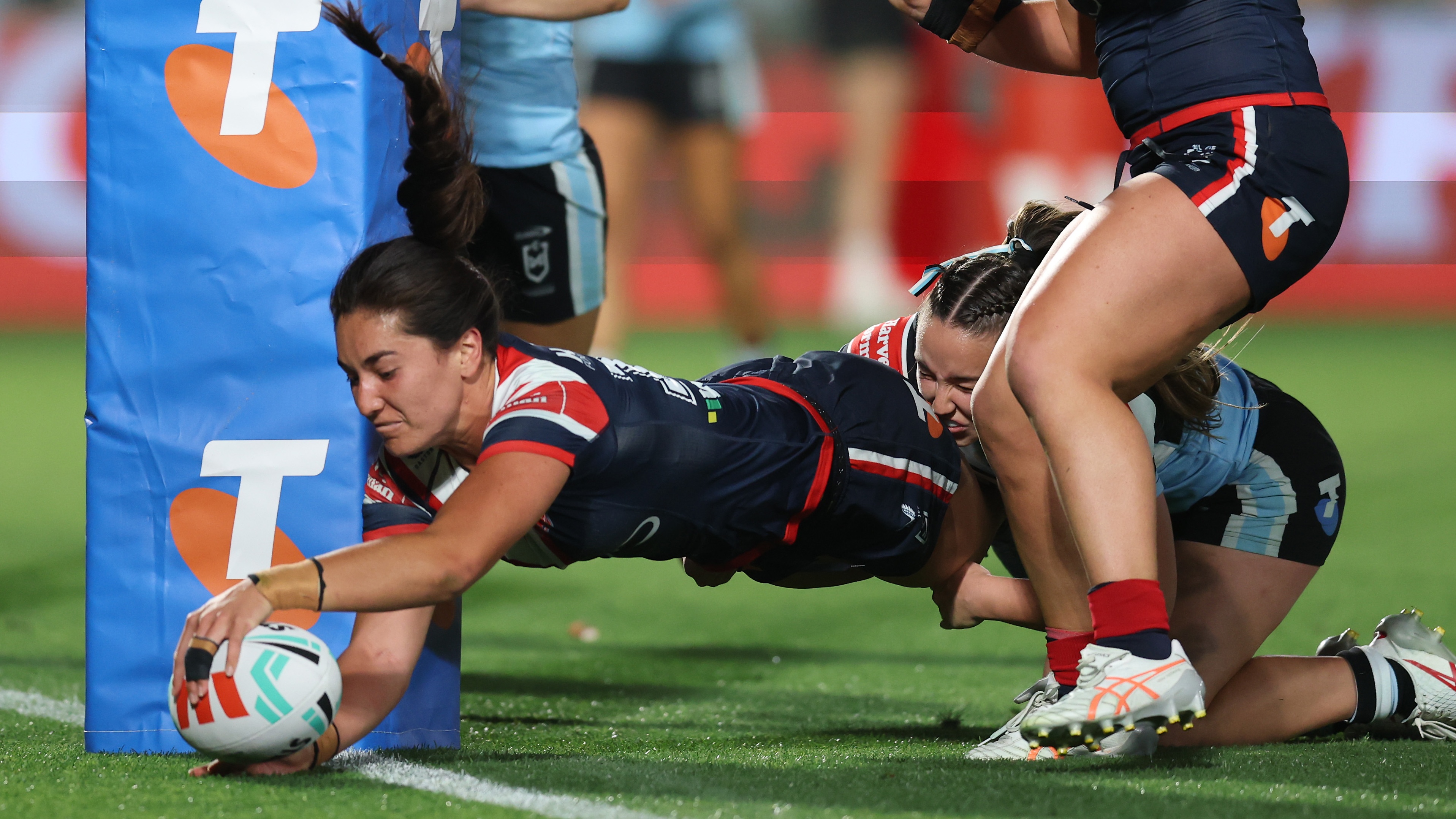 Olivia Kernick of the Roosters scores a try during the NRLW preliminary final match between Sydney Roosters and Cronulla Sharks at Polytec Stadium, on September 27, 2025, in Gosford, Australia. 
