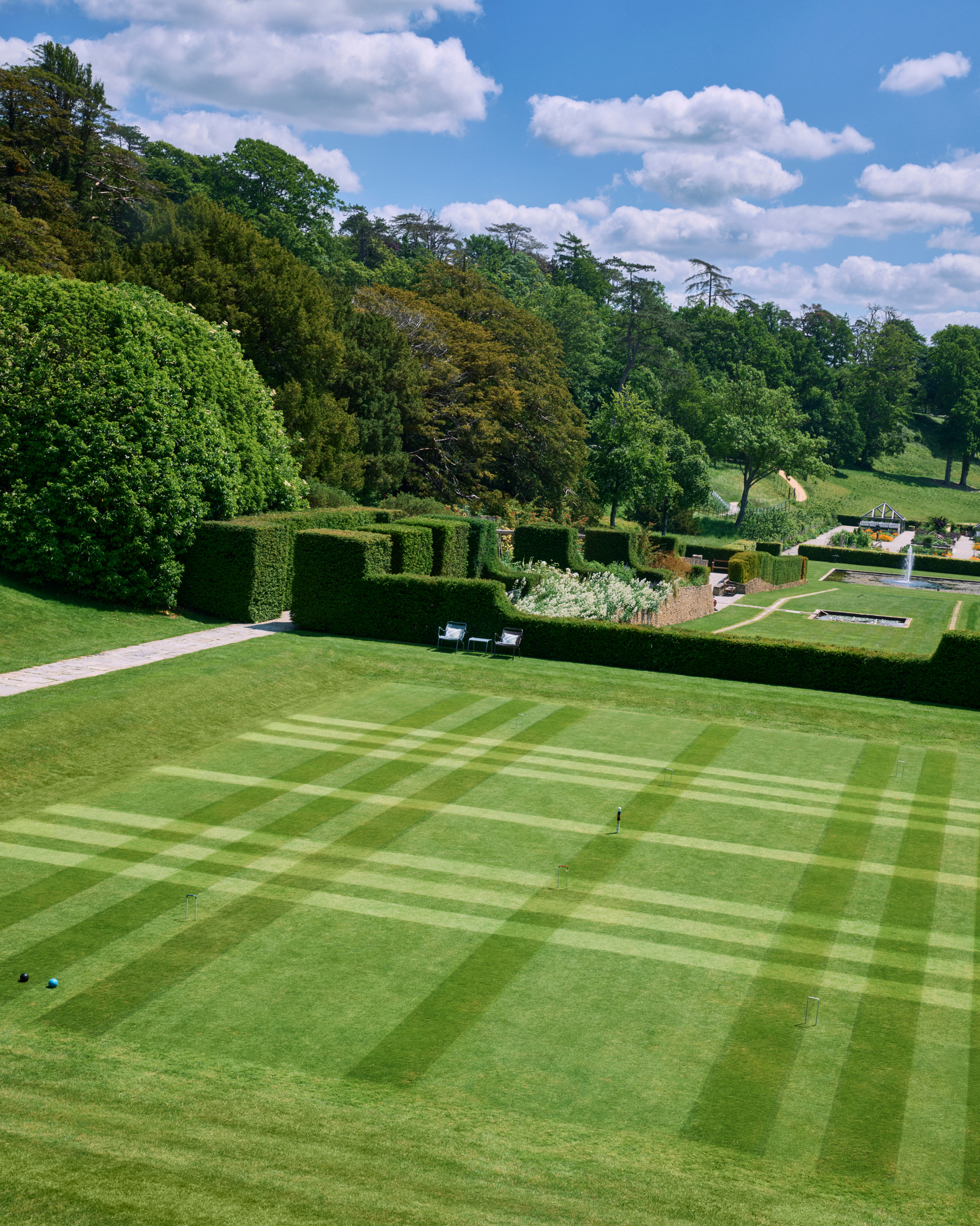 A manicured lawn mown in the design of Burberry's iconic plaid pattern