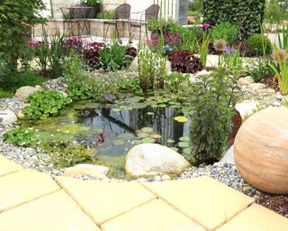 circular pond in the center of a paved patio