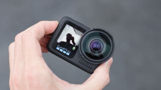 GoPro HERO13 Black action camera held in a hand