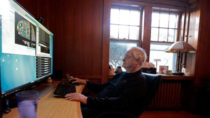 Harvard professor Dr. Bruce Fischl studies images of the human brain.