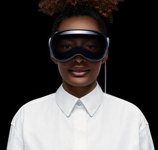 woman wearing the new Vision Pro headset