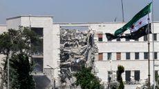 A view of the damage following Israeli strikes on the Syrian army and defence ministry headquarters in Damascus
