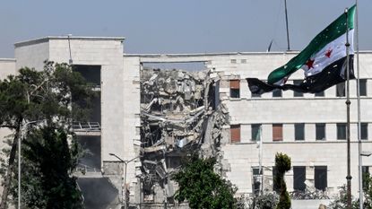 A view of the damage following Israeli strikes on the Syrian army and defence ministry headquarters in Damascus