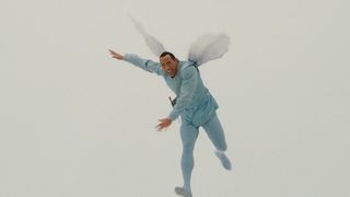 Dwayne Johnson wears a pink fairy costume and fairy wings in the comedy Tooth Fairy