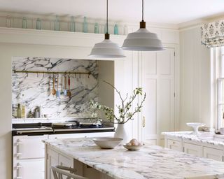 white kitchen with marble surfaces