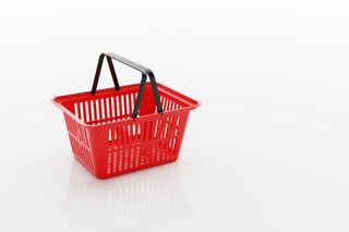 Empty red shopping basket isolated on white background