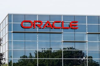 A red Oracle sign on its offices