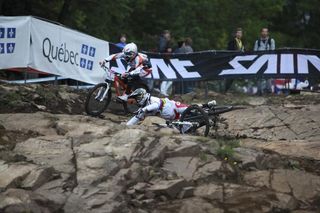 Racers tangle on the four cross course.