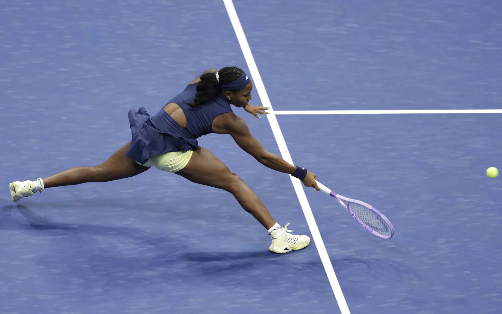 Coco Gauff's custom New Balance outfit at the 2026 US Open featured the navy blue and butter yellow color combination