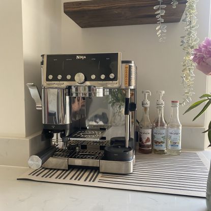 Trying a non stick coffee mat in an at-home coffee station 