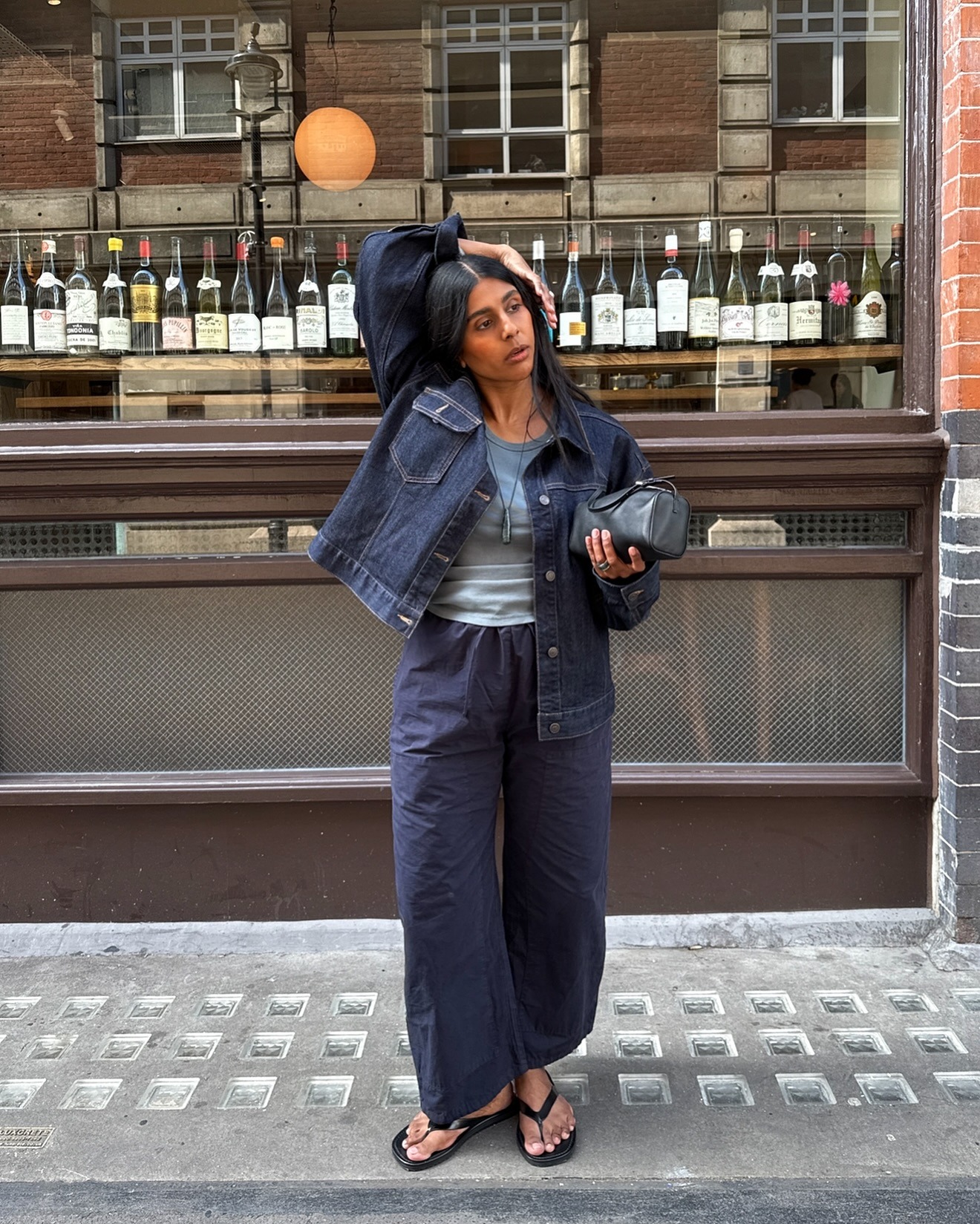 Monikh wearing Leset trousers in navy