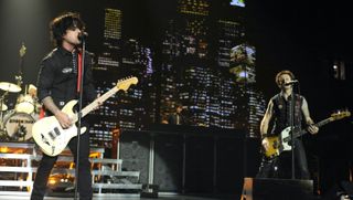 Billie Joe Armstrong and Mike Dirnt of Green Day perform in support of the bands' 21st Century Breakdown release at Arco Arena on August 24, 2009 in Sacramento, California