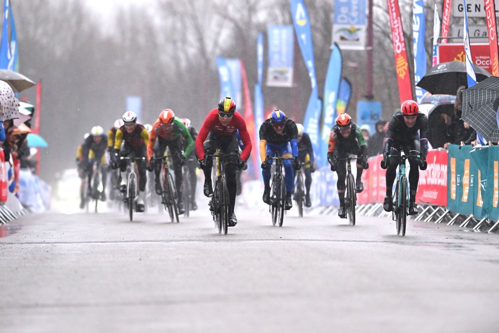 BESSEGES FRANCE FEBRUARY 07 LR Stage winner Arnaud De Lie of Belgium and Team Lotto White Best Young Rider Jersey and Arnaud Demare of France and Team Arkea BB Hotels sprint at finish line during the 55th Etoile de Besseges Tour du Gard 2025 Stage 3 a 1362km stage from Besseges to Besseges Race shortened due to adverse weather conditions on February 07 2025 in Besseges France Photo by Billy CeustersGetty Images