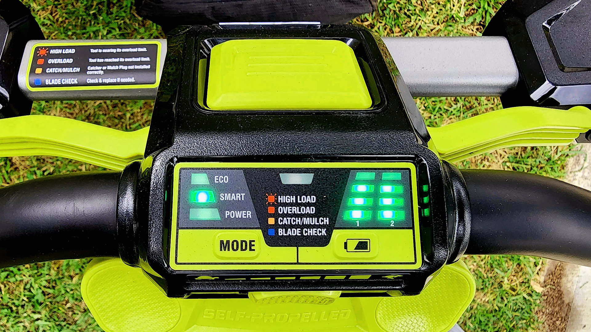 Close-up of Ryobi 36V HP Self-Propelled Lawn Mower's battery gauge.