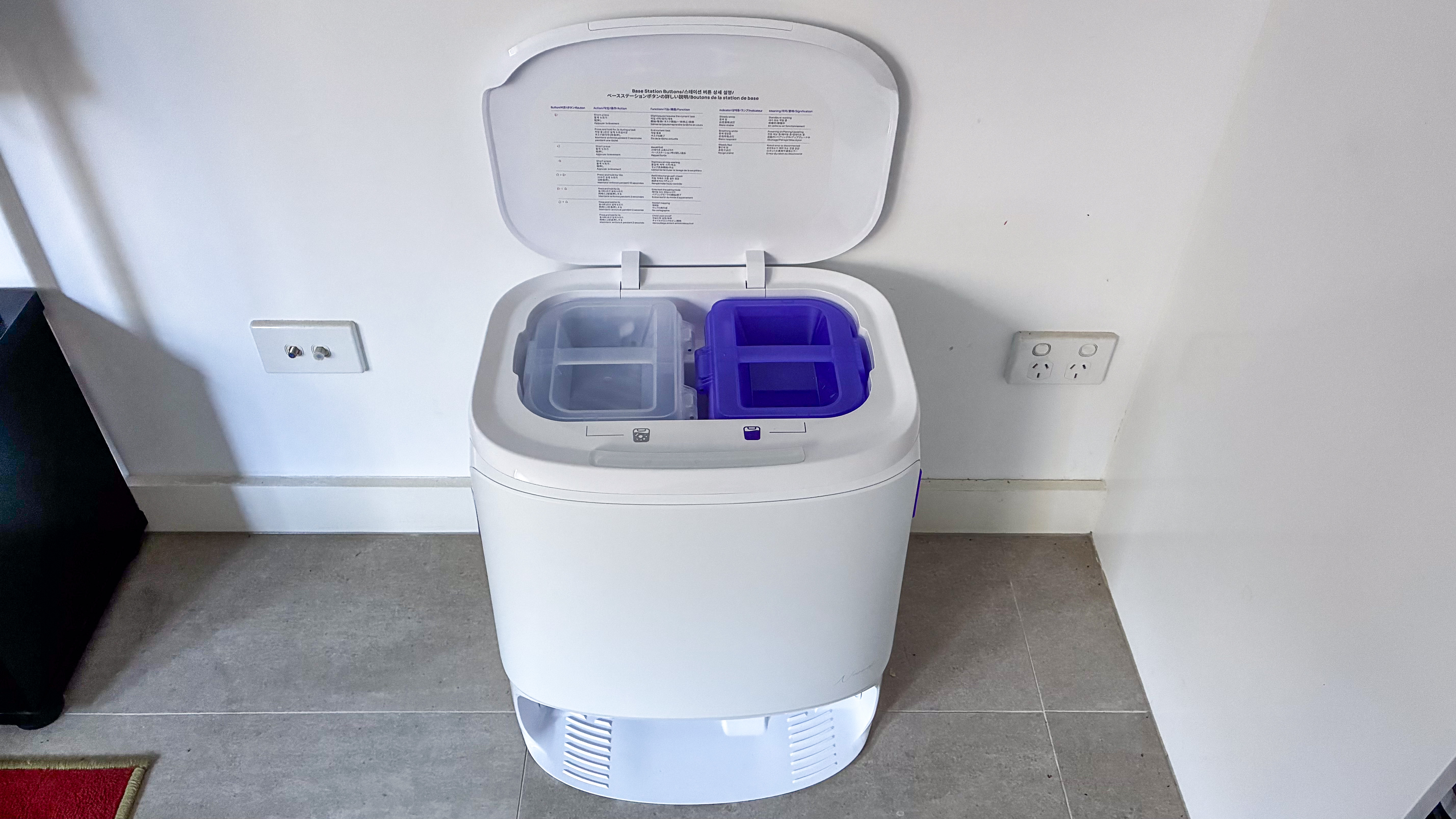 The lid of the Narwal Freo Z10 base station open to reveal the water tanks