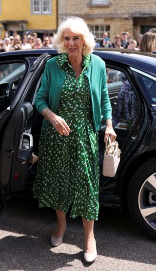 Queen Camilla wearing a Lady Dior bag