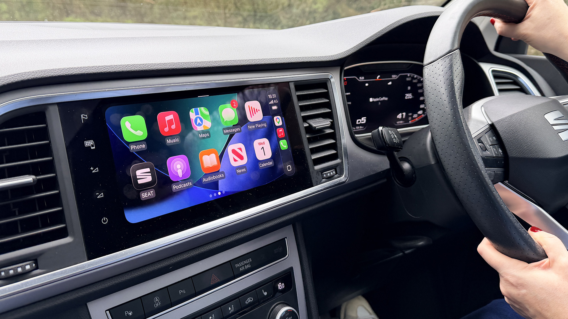 Apple CarPlay running inside a Seat Ateca on its in-car infotainment screen