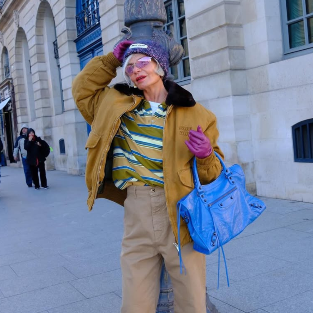 @greceghanem wears barn jacket, brown jeans and rugby shirt