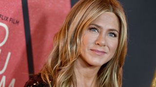 Jennifer Aniston has warm golden highlights as she attends the premiere of Netflix's 'Dumplin' at TCL Chinese 6 Theatres on December 6, 2018 in Hollywood, California.