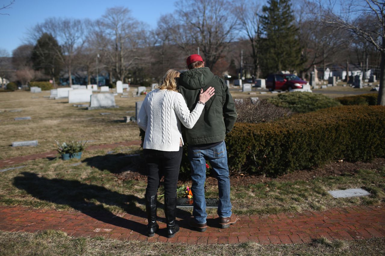 A family mourns the loss of their loved one, who died from a heroin overdose in 2015.