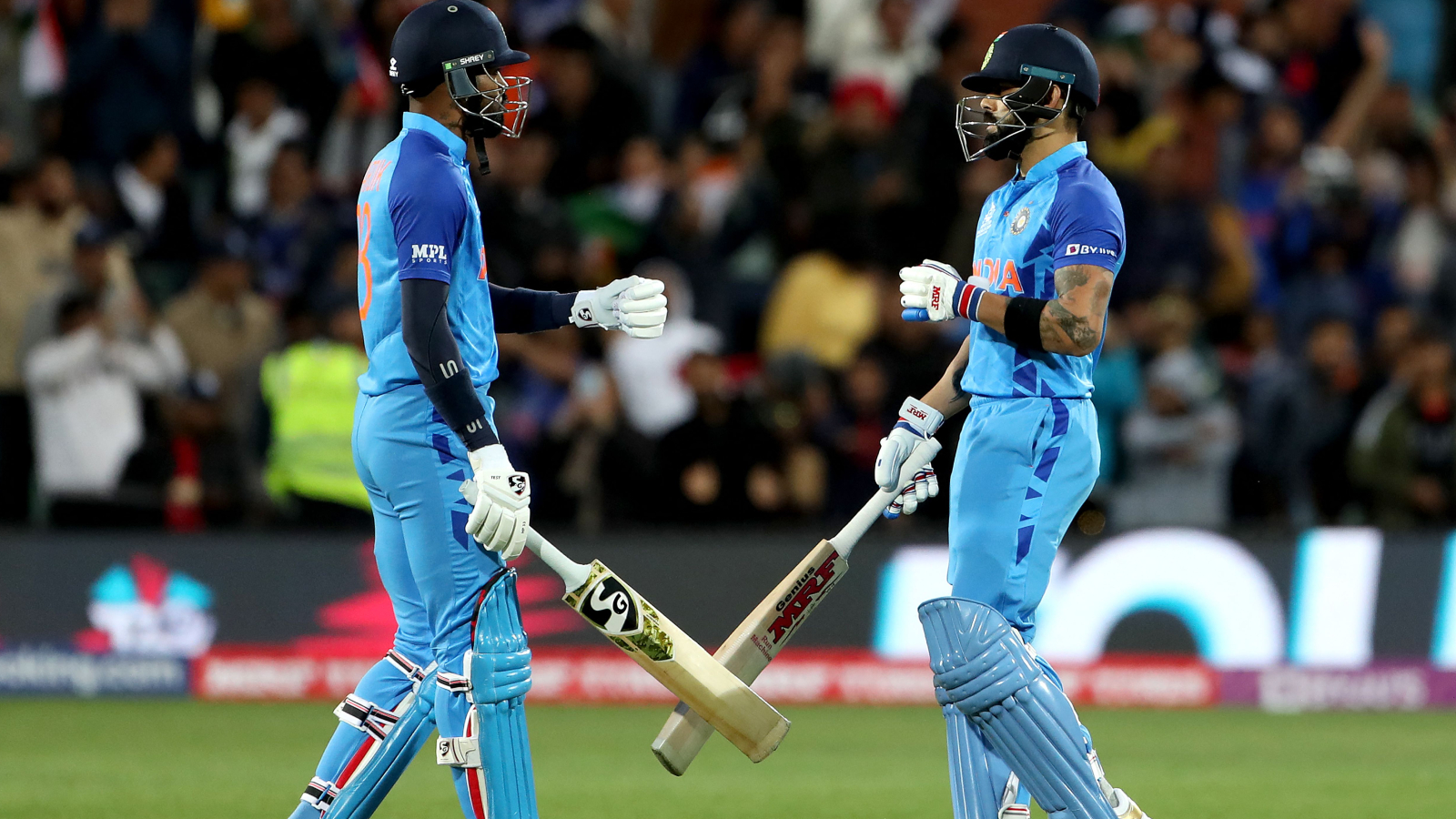 Hardik Pandya and Virat Kohli of India during a T20 Cricket World Cup 2022 match against Bangladesh.