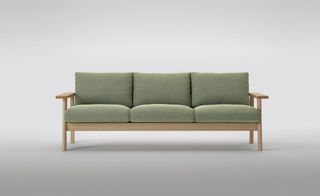 Green sofa pads on wooden frame