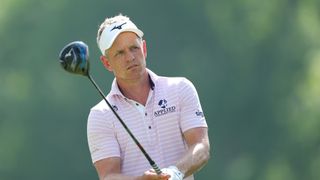 Luke Donald of England lines up his shot from the 12th tee during the first round of the 2024 PGA Championship at Valhalla Golf Club on May 16, 2024 in Louisville, Kentucky.
