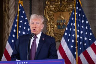 US President-elect Donald Trump speaks to members of the media during a press conference at the Mar-a-Lago