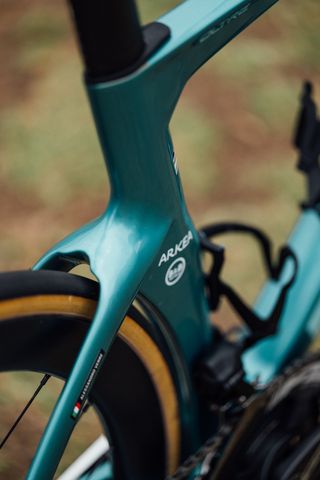 The seatstay junction of an Arkea Bianchi Oltre in celeste green