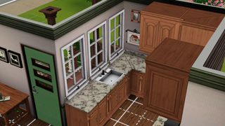 The Sims 3 - an overhead view of a kitchen being built