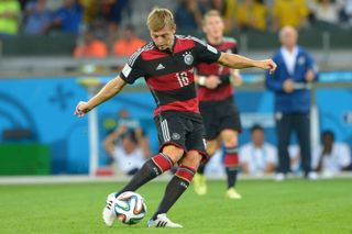 Toni Kroos makes a pass while playing for Germany against Brazil in the semi-finals of the 2014 World Cup