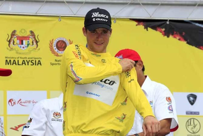 Theo Bos (Blanco) pulls on the yellow jersey at the Tour de Langkawi