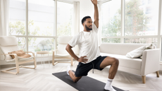 A man performing hip flexor stretch