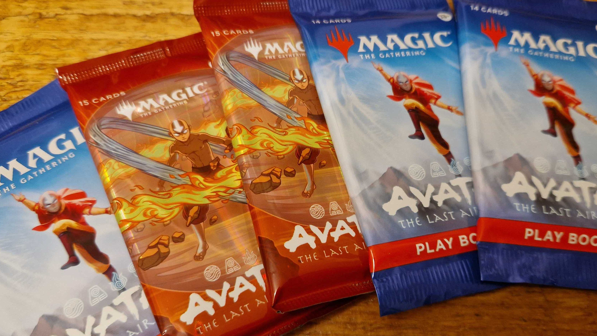 MTG Avatar: The Last Airbender Play and Collector Boosters on a wooden surface