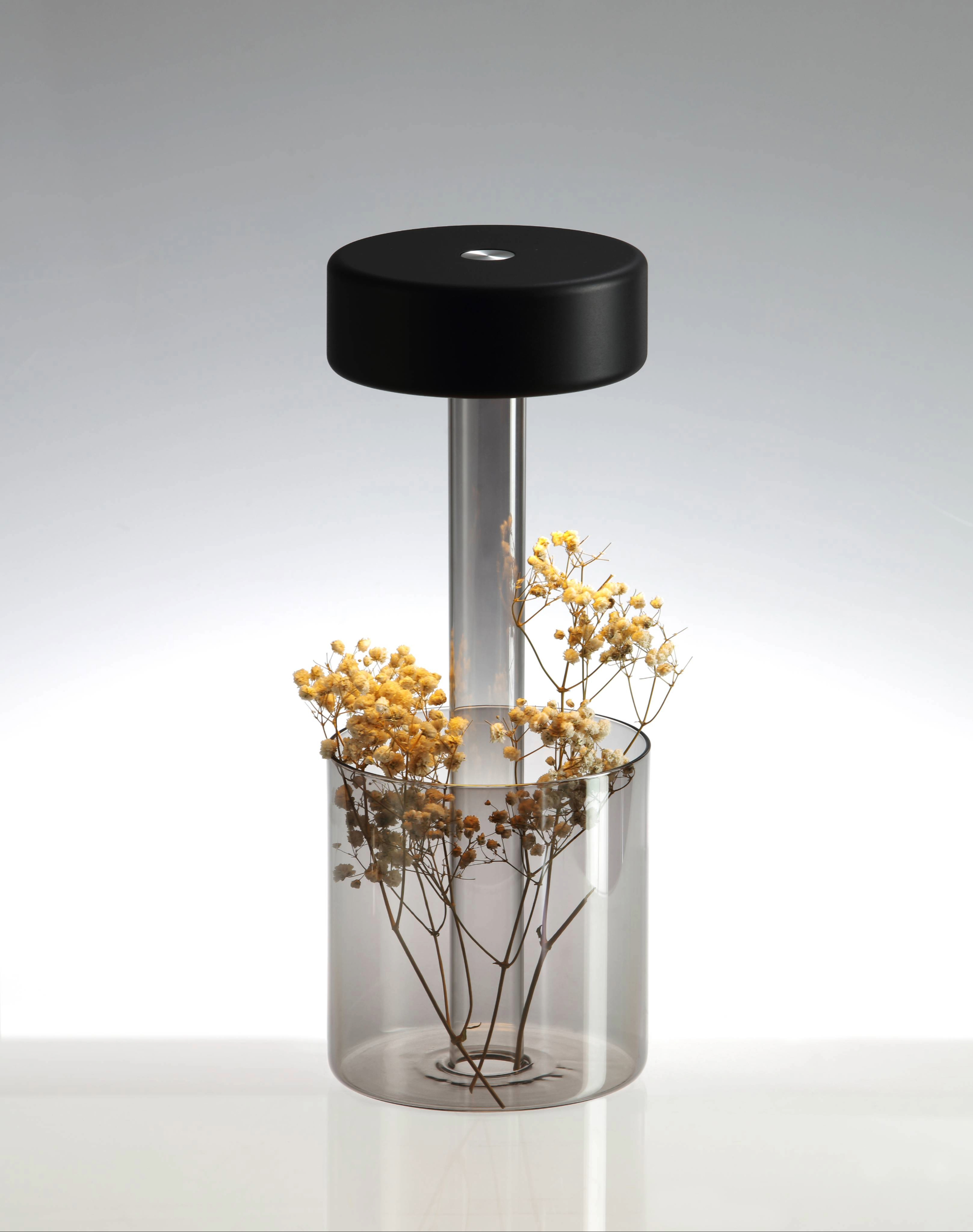 Portable table lamp-vase hybrid in black