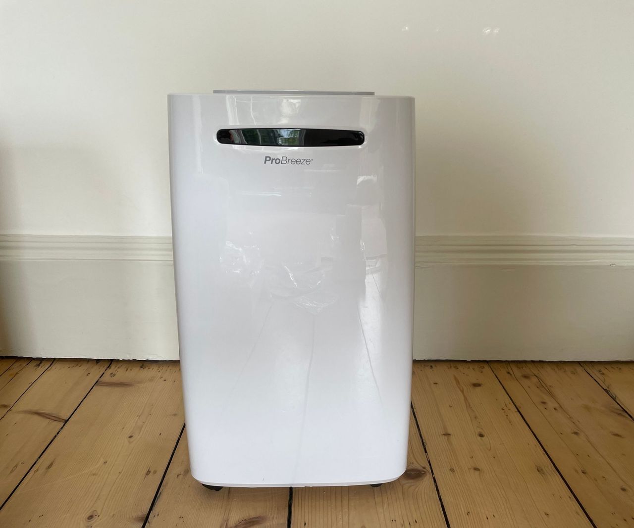 Pro Breeze 20L Dehumidifier on a wooden lounge floor