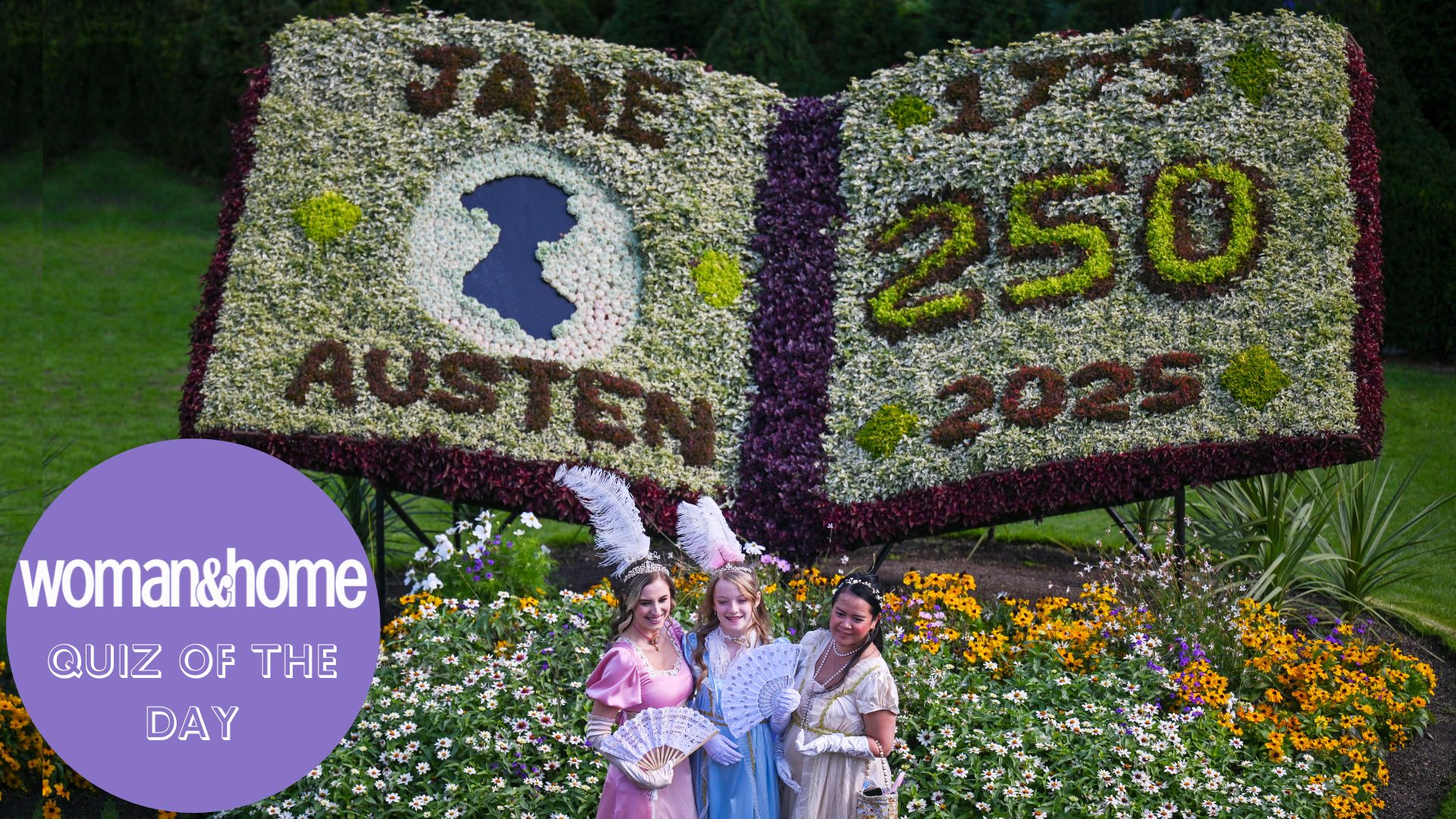 Women in regency costumes pose in front of a flower display reading 'Jane Austen 250: 1775-2025' in Bath, England