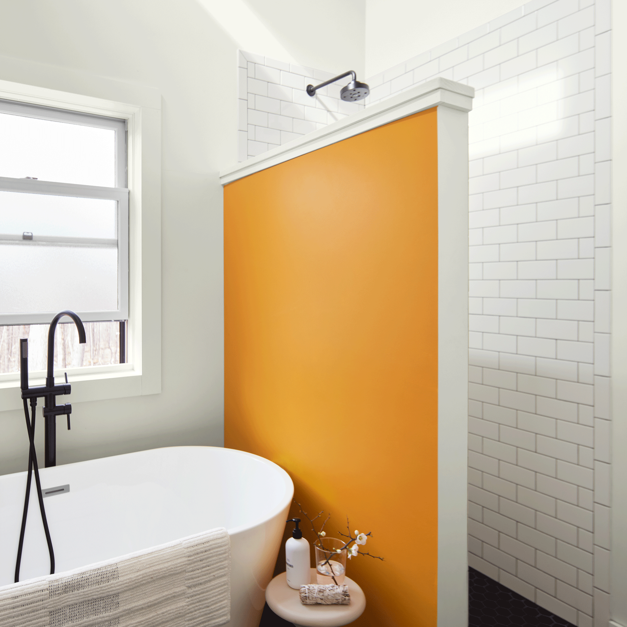 White bathroom with orange wall