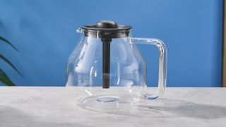 a glass carafe for dispensing coffee made by Aarke for the Aarke drip brewer