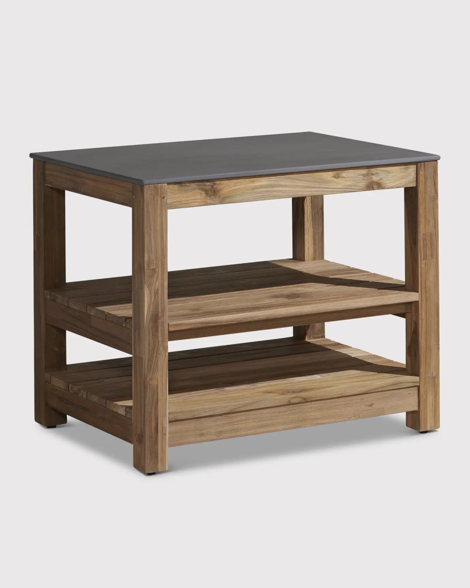 A wooden outdoor kitchen unit with a shelf and a dark gray worktop.