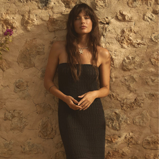 woman wearing a dress from the Anthropologie new in page