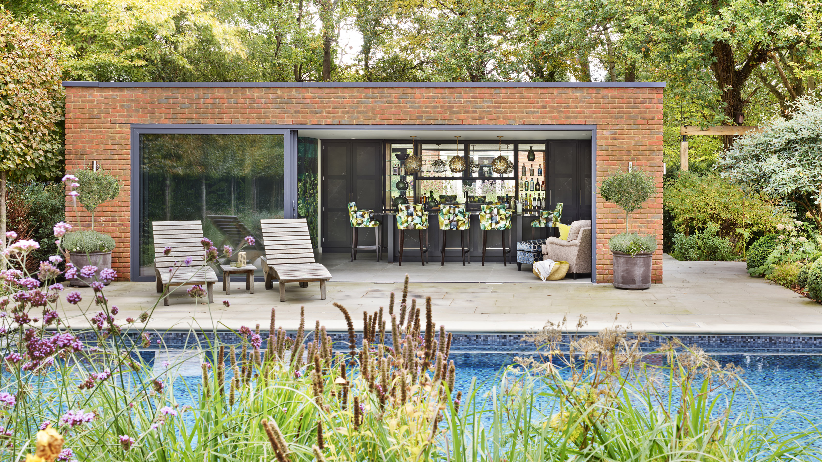 Elegant Poolhouse Countertops: Half Inside, Half Outside