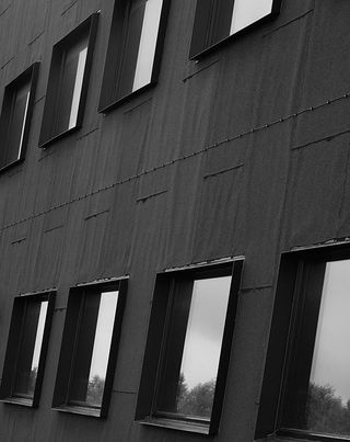 Grey building with glass windows